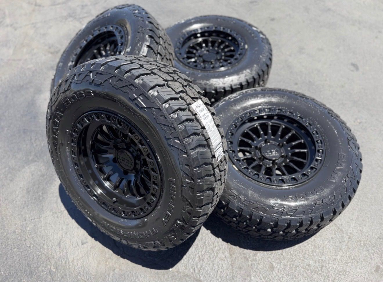 New 285/70r17 Mickey Thompson Baja Boss AT Black Lock Grit 6x5.5 Chevy Silverado 1500 GMC Sierra Tacoma Toyota 3 peak snow rated