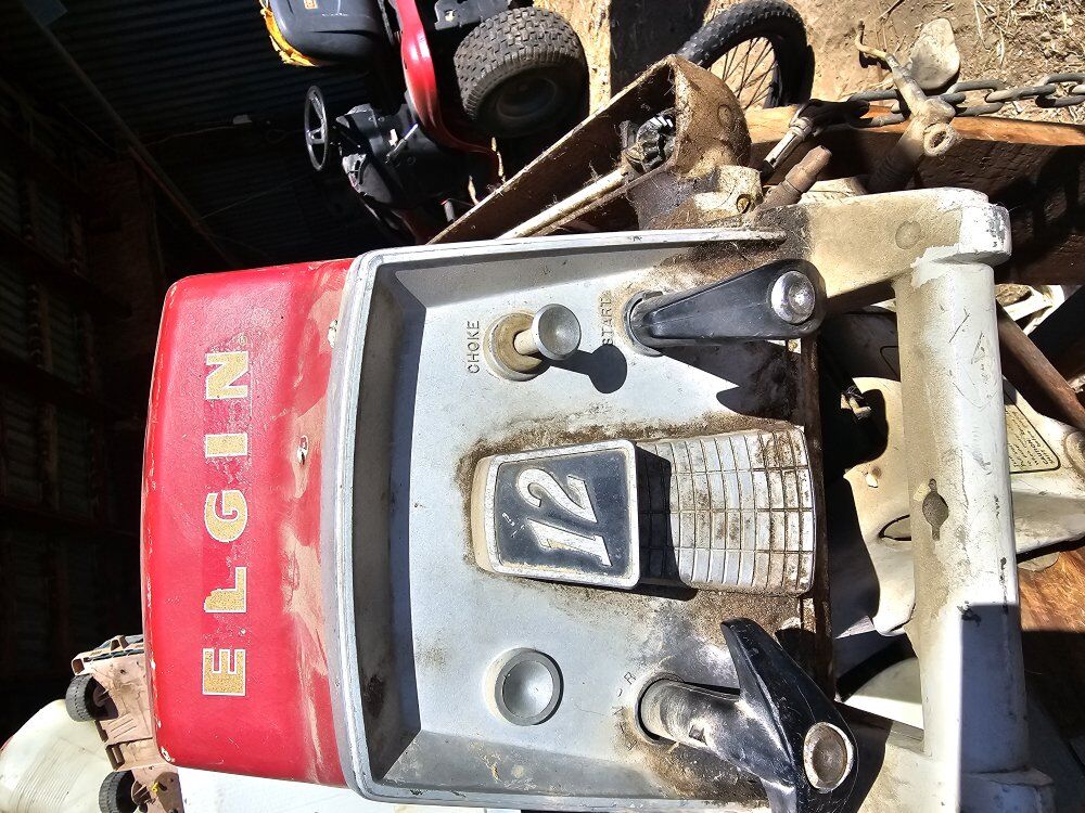 Elgin 12 outboard motor