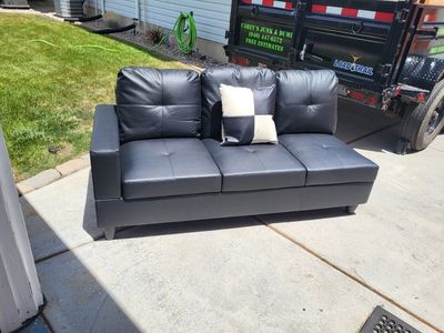 Leather/Vinyl Sofa Piece w/Pillows
Black**