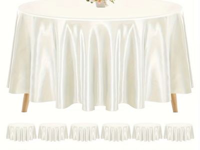 Brand new 12-pack of ivory satin 108” round tablecloths