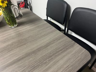 Modern Wood-Look Dining Table with 6 Black Upholstered Chairs Set