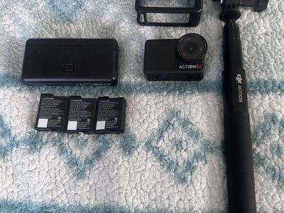 DJI Osmo Action 5 Pro Camera Bundle with Extension Rod, Charging Case, and 3 Batteries