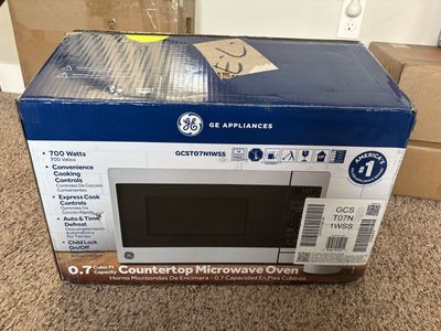 GE GCST07N1WSS 0.7 Cu. Ft. Countertop Microwave Oven