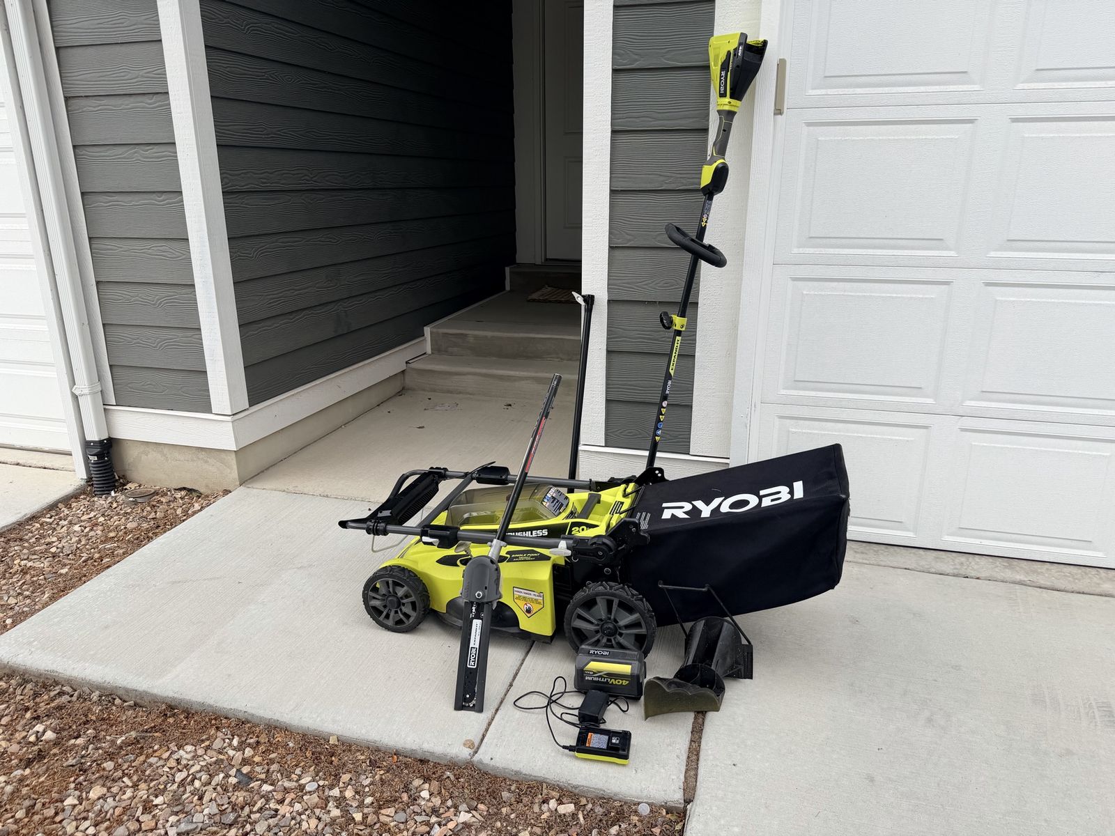 Ryobi 40V Brushless Lawn Care Bundle (Mower, Trimmer, Pole Saw + Battery)
