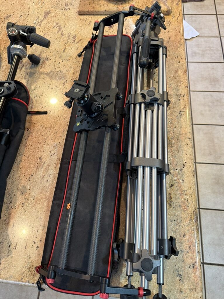 Manfrotto and Raveli Tripods with Dolly And Slider