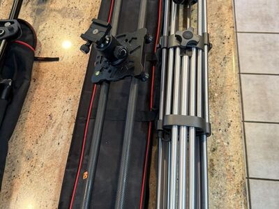 Manfrotto and Raveli Tripods with Dolly And Slider