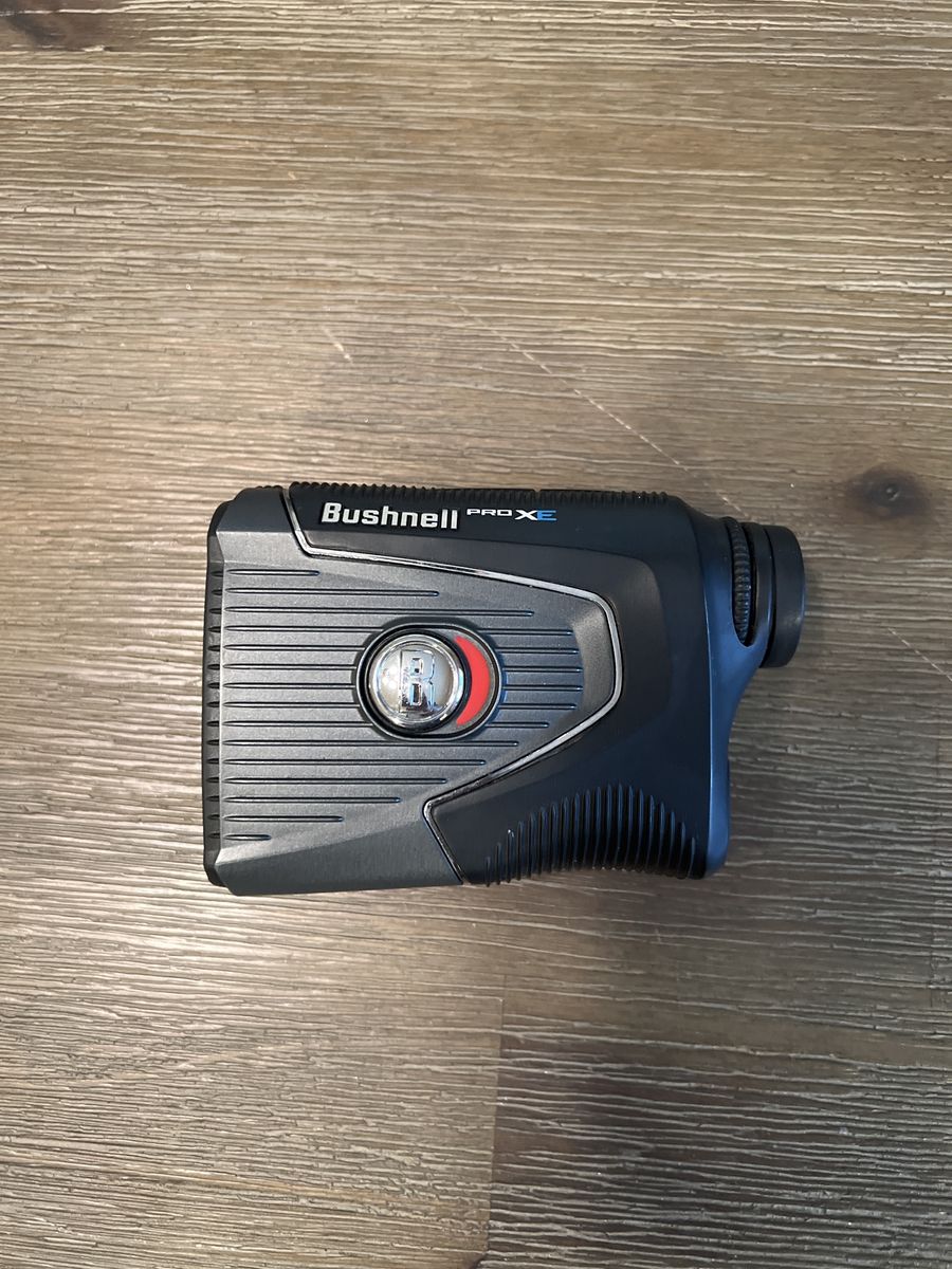 Bushnell Pro XE Golf Laser Rangefinder with BITE Magnetic Grip - Used Excellent Condition