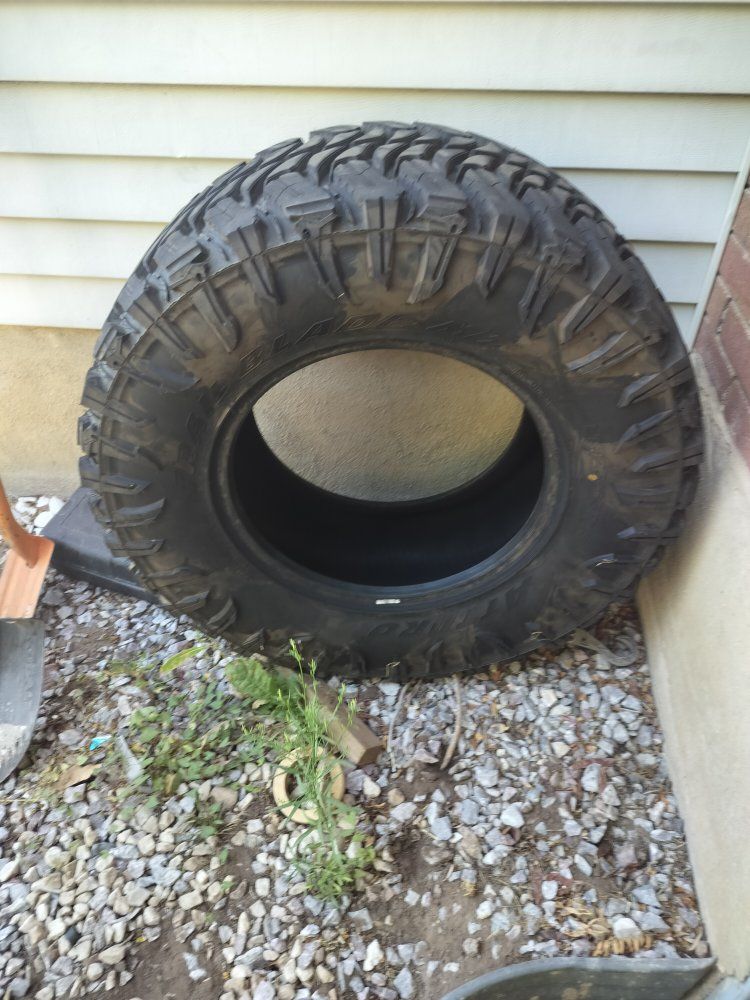 Used Off-Road Truck Tire - side wall damage