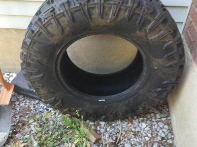Used Off-Road Truck Tire - side wall damage