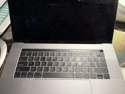 MacBook Pro 15" Touch Bar (2017) — For Parts/Repair — Powers On