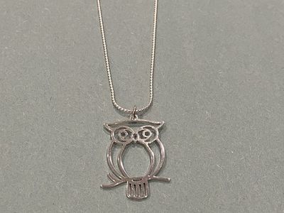 Silver Owl Pendant On Silver Necklace
