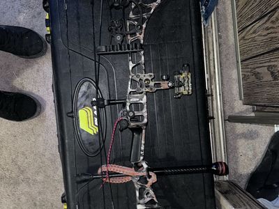 Mathews Compound Bow in Camo with Quiver, Sight, and Stabilizer