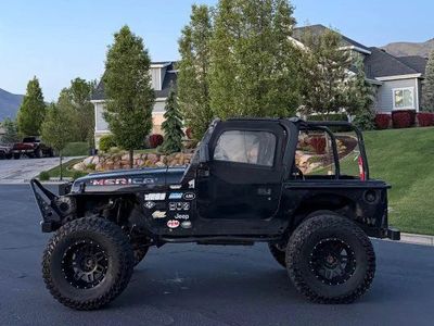 Custom Built Jeep: Lifted, Off-Road Tires, Winch, Roll Cage - Ready for Adventure
