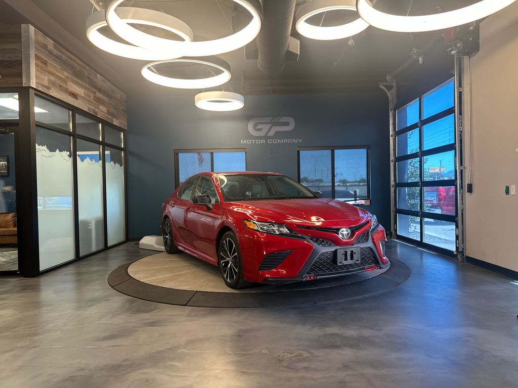 2020 Toyota Camry SE — rebuilt & branded title, 23% below market