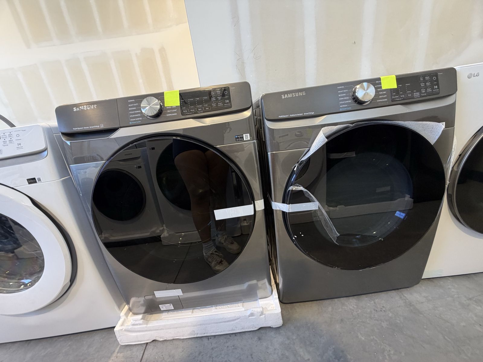 New open box Samsung 4.5 cu. ft. Large Capacity Smart Front Load Washer with Super Speed Wash and 7.5 cu. ft. Smart ELECTRIC Dry