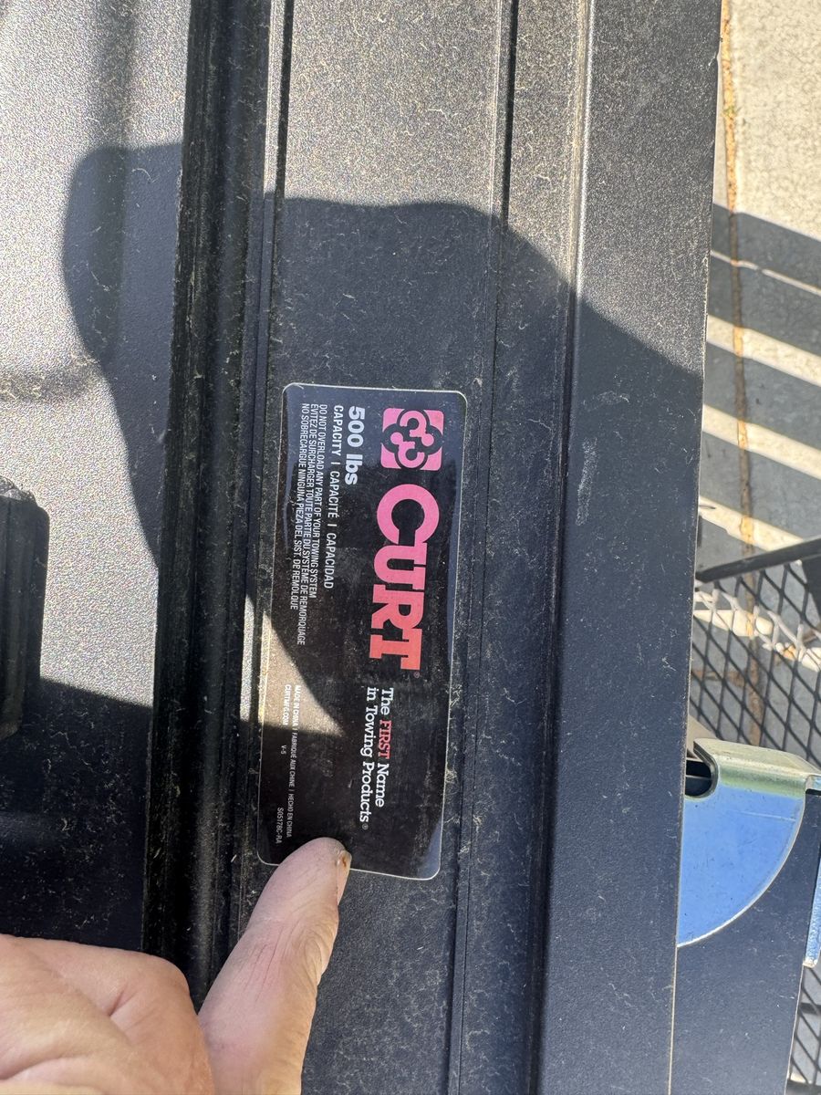 Curt 500 lbs Hitch mounted cargo carrier and ramp