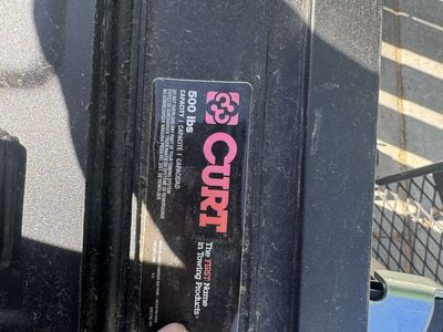 Curt 500 lbs Hitch mounted cargo carrier and ramp