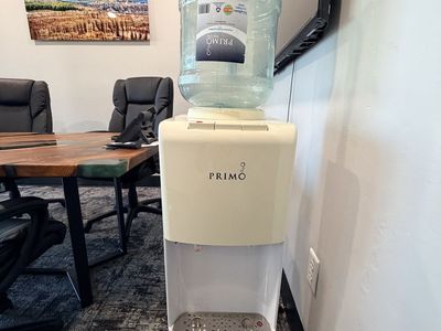 Primo Water Dispenser With Water Jugs