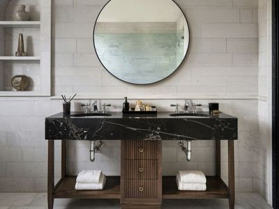 Black round wall mirror