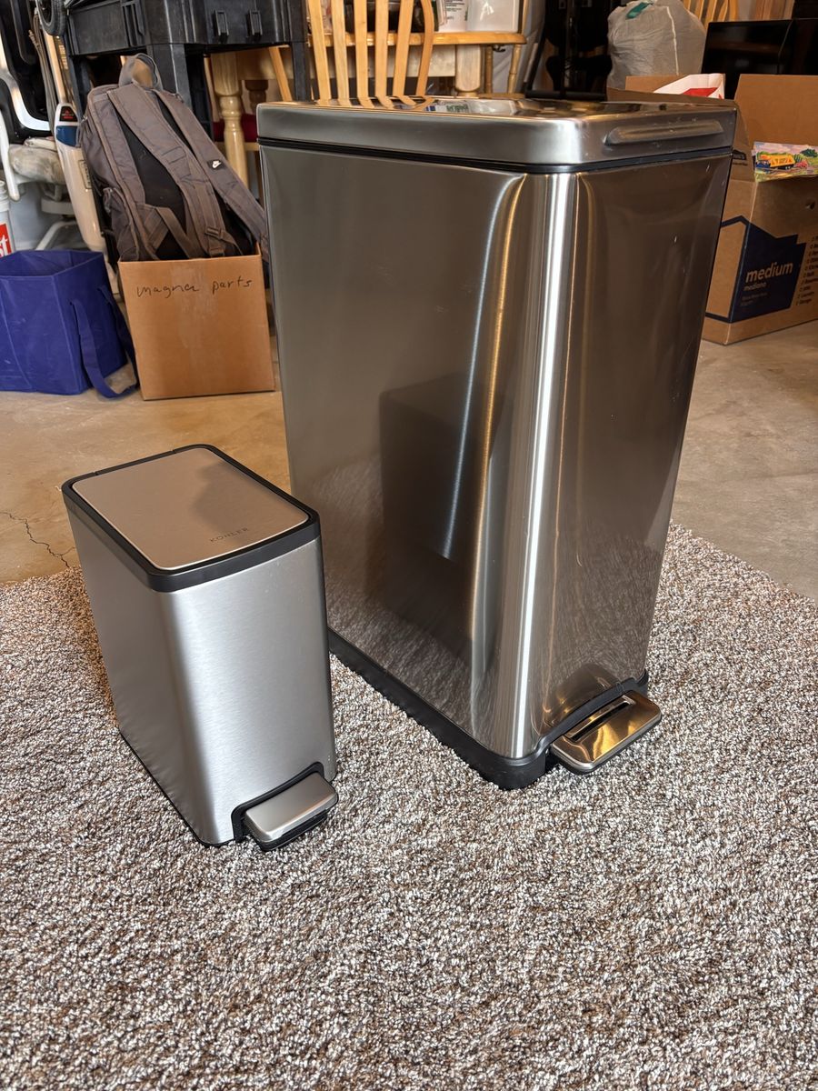 Stainless steel garbage cans.