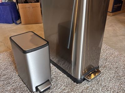 Stainless steel garbage cans.