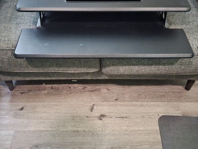 Adjustable desk riser