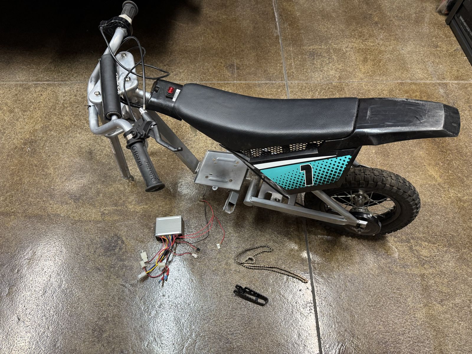 Razor mx350 frame, electric controller, seat , handlebars, throttle and rear tire