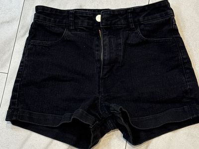 A Size 2 Black Denim Shorts.