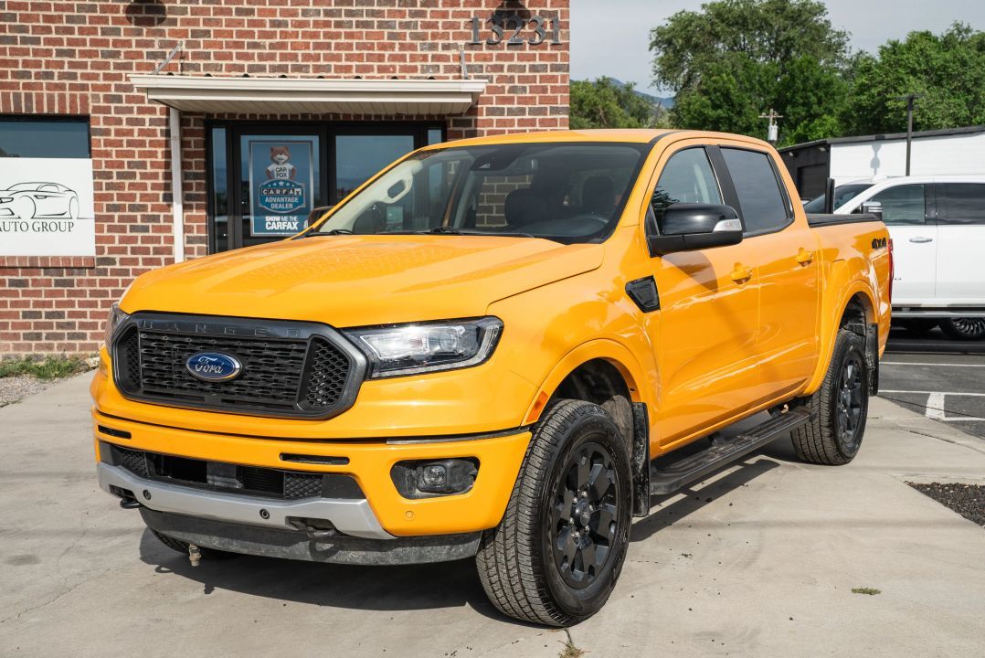 2022 Ford Ranger Lariat — rebuilt & branded title, 17% below market
