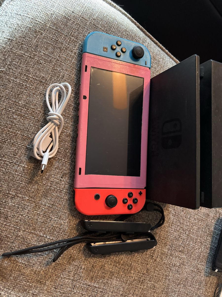 Like new Nintendo switch with charging console