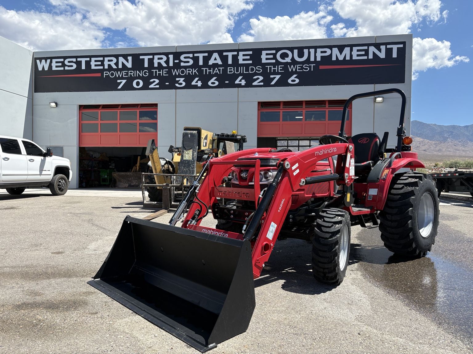 Mahindra 1626 Tractor with Front Loader Bucket - Red