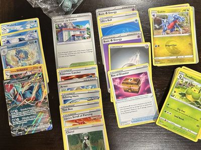 Pokémon TCG Card Lot featuring Roaring Moon ex 124/182, Trainer Cards & Dice