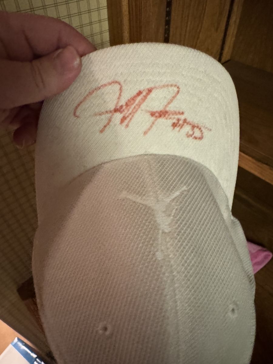 White Jordan hat signed by Michael Jordan’s son Jeffrey Jordan
