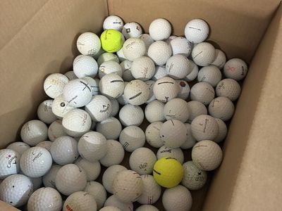100 used golf balls