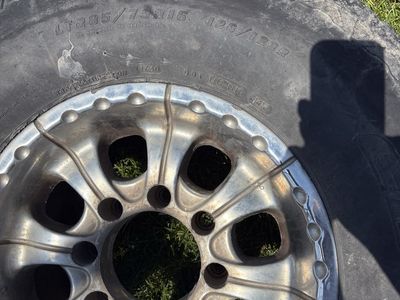 LT285/75R16 All-Terrain Tire with Chrome Rim - Good Tread and one black Rim from a f250 7.3