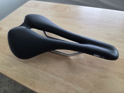 Bontrager Ajna Elite Bike Saddle Titanium Rails Black 164mm, Wide cycling seat