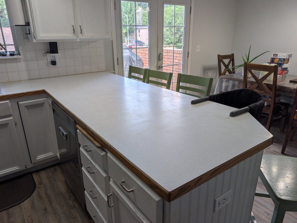 White Kitchen Cabinets with custom Pull-Out Storage
