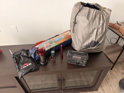 Title: $150 OBO – Slumberjack 0° Sleeping Bag, 2-Person Tent, Weather Radio & Survival Kit