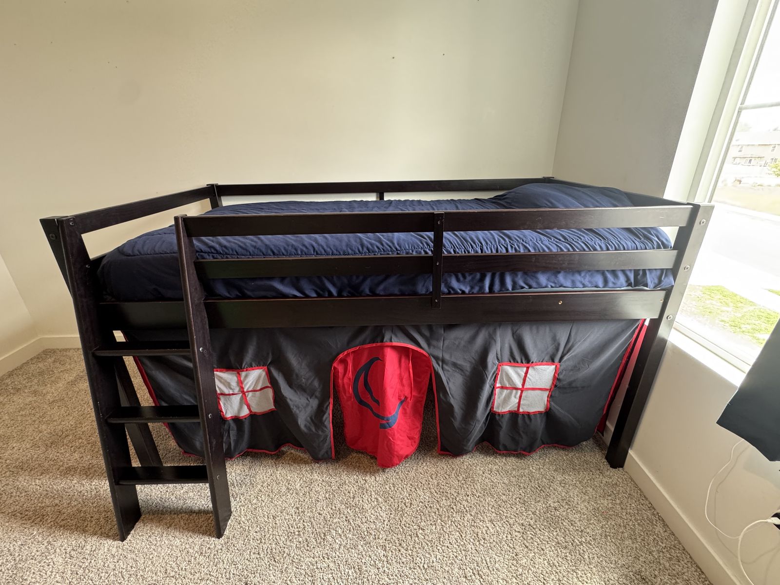 Loft bed with play area