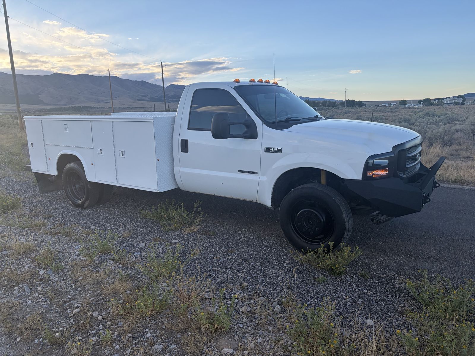 2002 Ford F450 utility bed. Runs great new glow plugs new glow plug relay new radiator new water pump new LED lights all the way