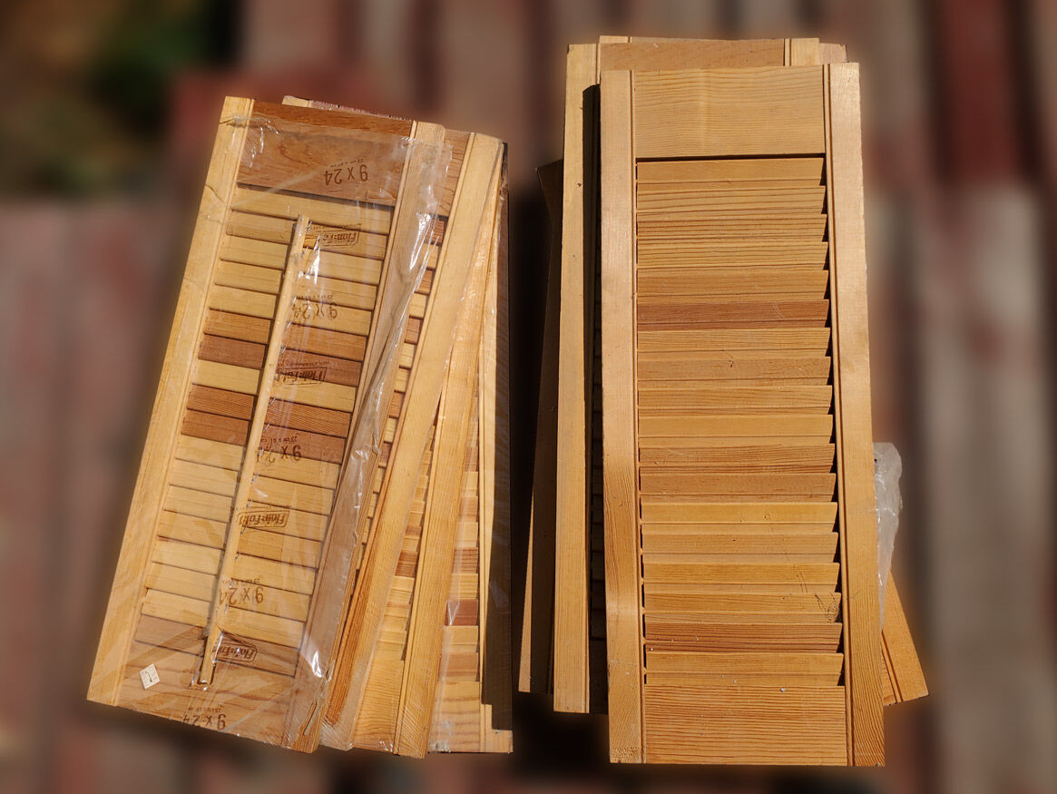 Twelve 9x24" wood shutters