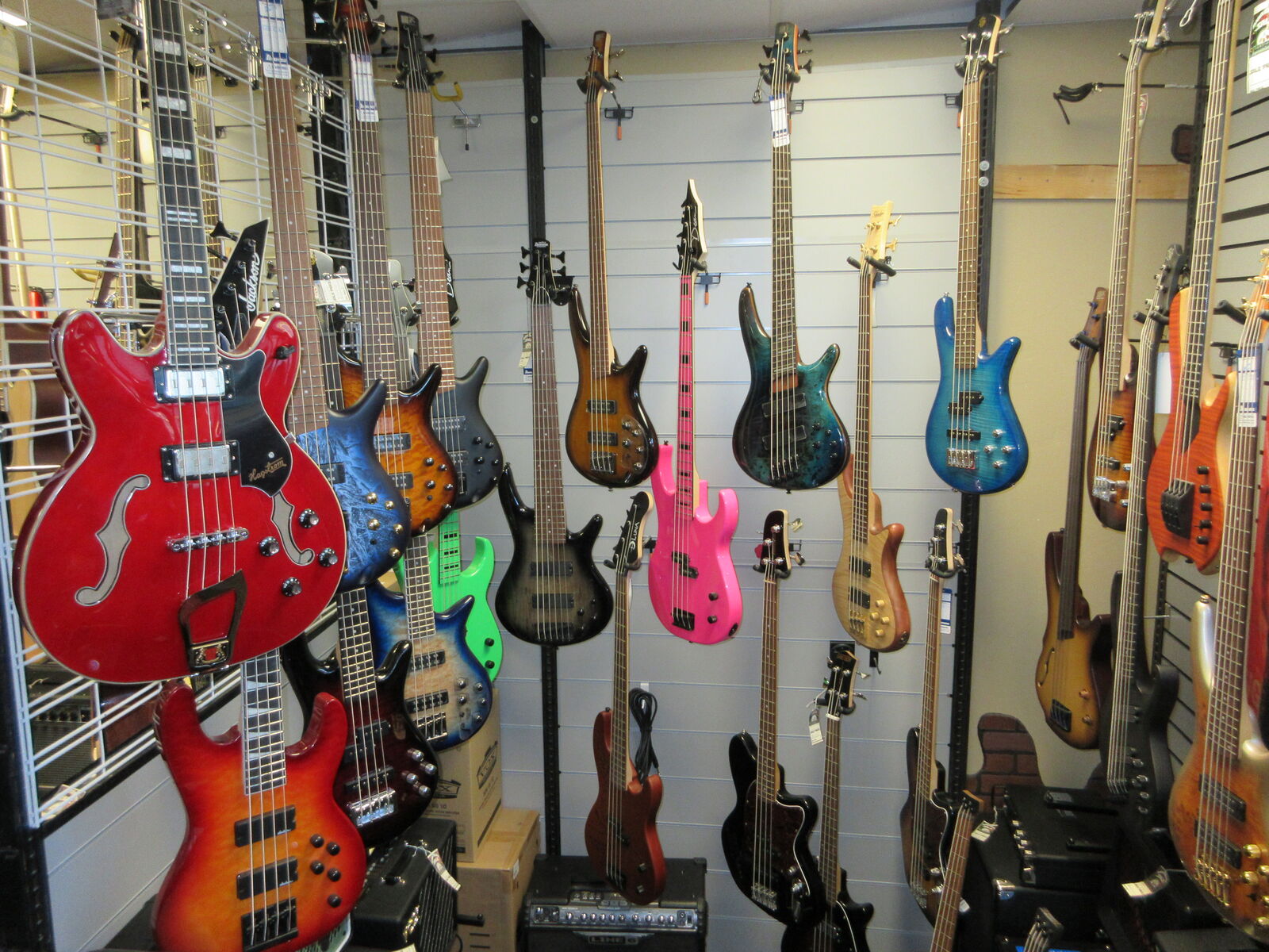 bass guitars over 60 in stock and amps on sale