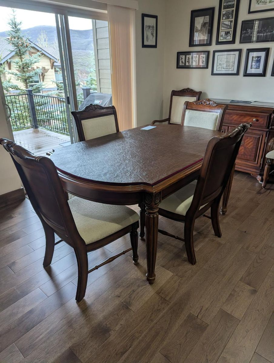 Elegant dining room table w/extension 6 chairs, hutch, and coffee table all for $300