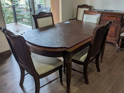 Elegant dining room table w/extension 6 chairs, hutch, and coffee table all for $300