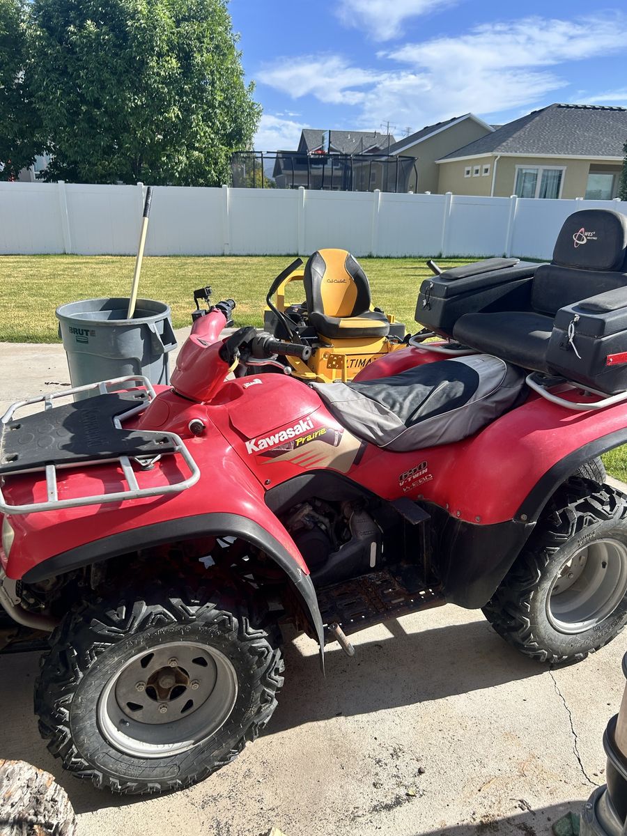 2002 Kawasaki 650 prairie atv 4 wheeler with plow