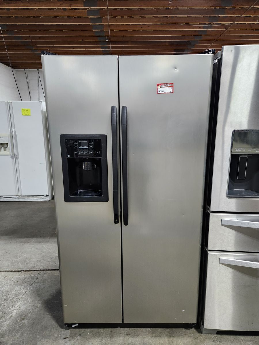 Great GE stainless steel side by side Fridge! W-Warranty