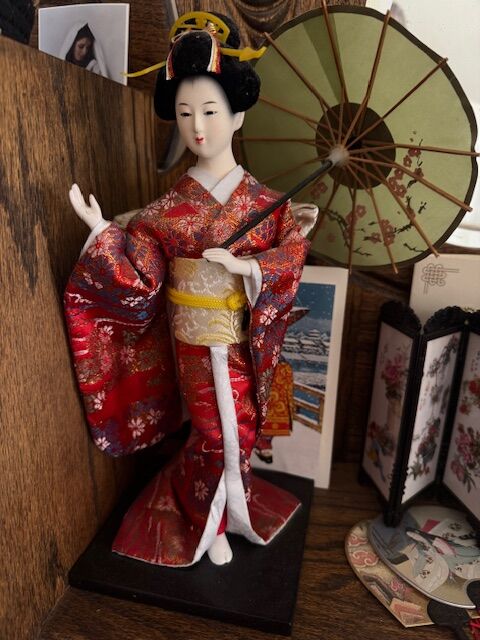 traditional Japanese doll in kimono from Japan; A vintage Japanese geisha or ningyo doll