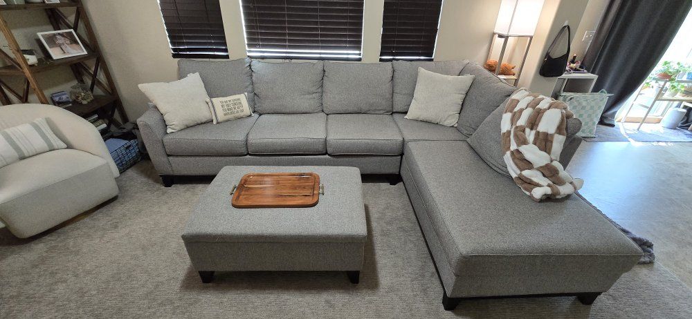 Grey Sectional sofa with matching storage ottoman