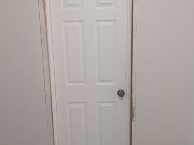 Various Used Pre-Hung Interior Door - 6-Panel, hollow-core, black/oil rub hardware.