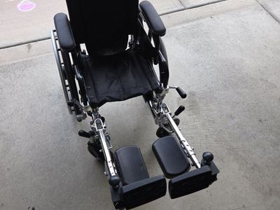Drive Medical K4 12" Lightweight Black Transport Wheelchair with Footrests